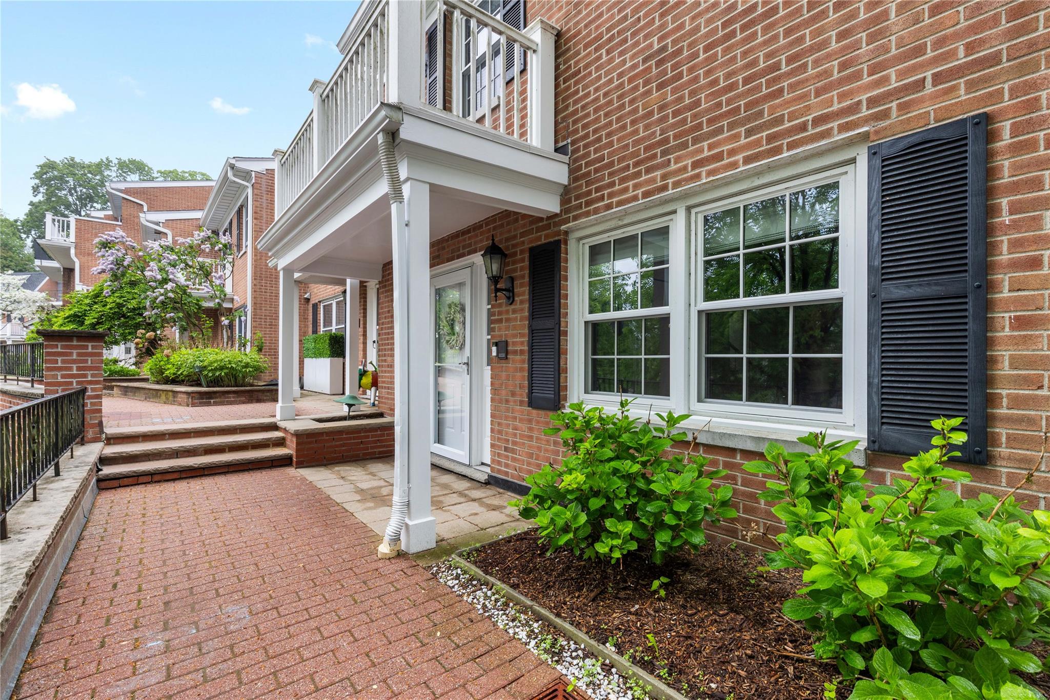 1050 Boston Post Road Rye, NY 10580 - Photo 1 of 1 a house with a garden view