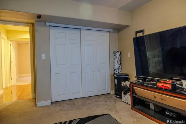 a view of balcony with wooden floor and fence