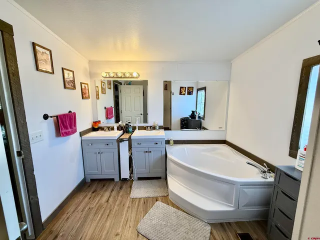 a hallway with toys and wooden floor