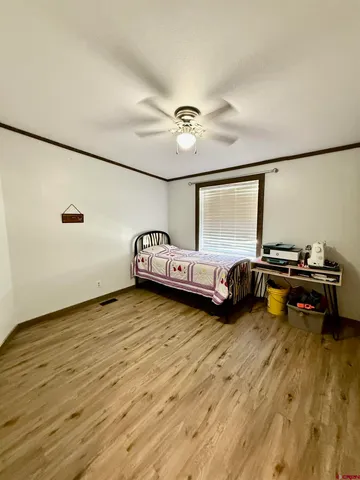 a bathroom with a toilet a sink and a shower