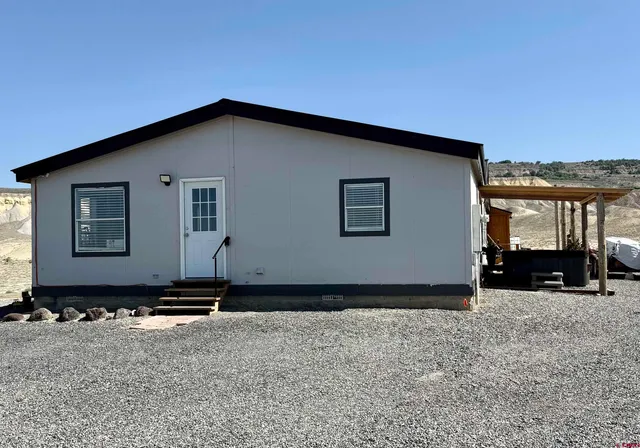 a view of backyard with barbeque grill and stove