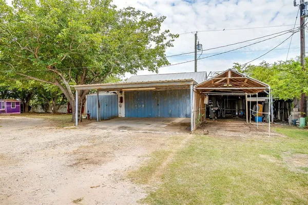 a front view of a house with a garage