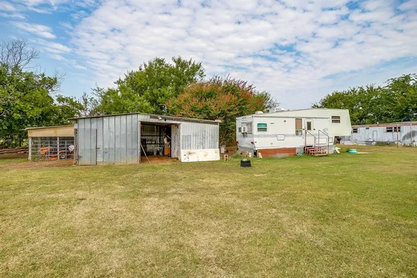front view of a house with a big yard