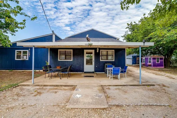 a view of a house with a patio