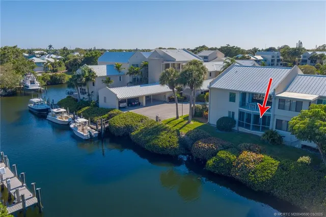 an aerial view of a house with a garden