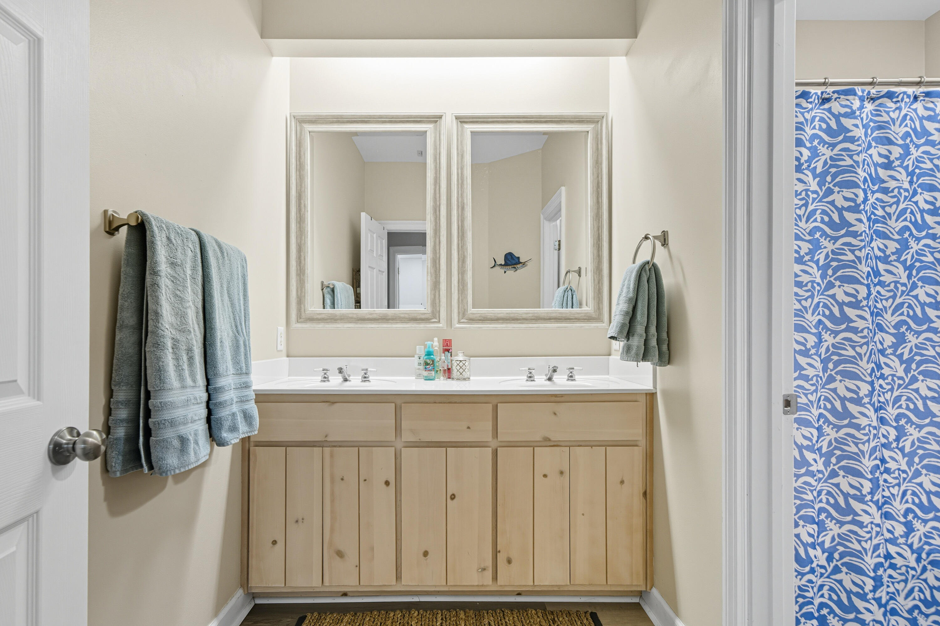 8 Corte Palma, Unit 61A Santa Rosa Beach, FL 32459 - Photo 13 of 32 a bathroom with a sink and a mirror