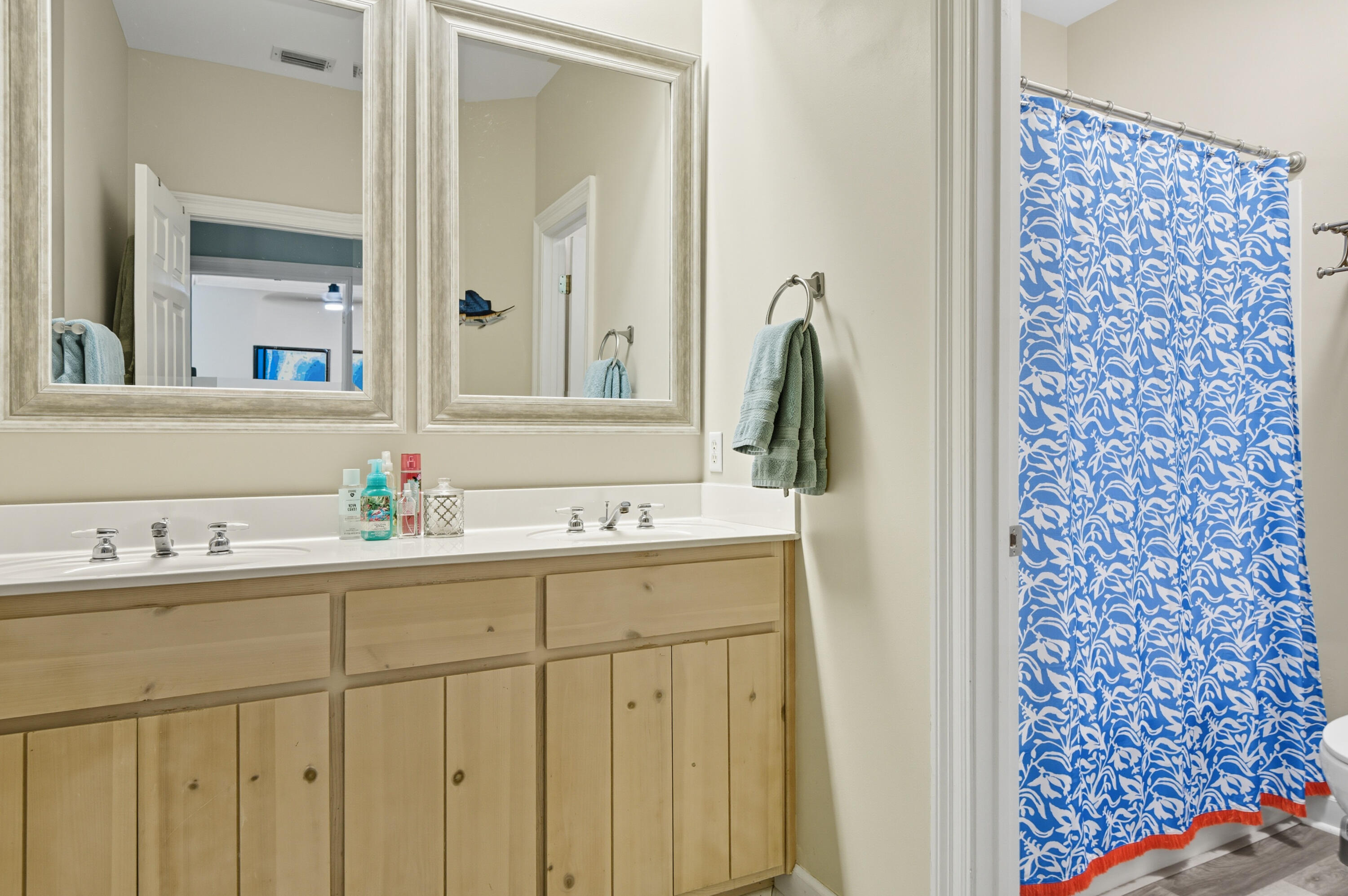 8 Corte Palma, Unit 61A Santa Rosa Beach, FL 32459 - Photo 14 of 32 a bathroom with a sink and a mirror