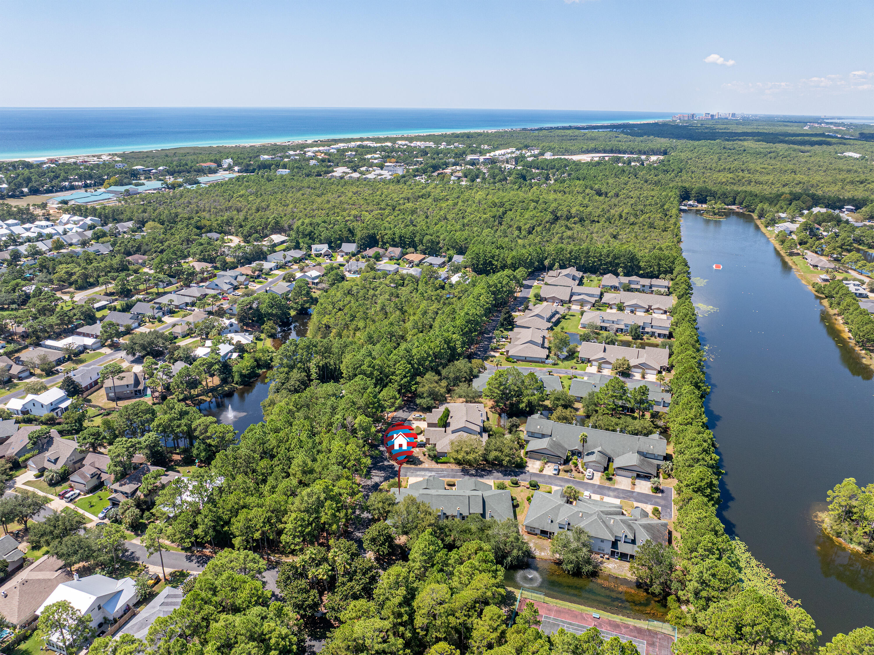 8 Corte Palma, Unit 61A Santa Rosa Beach, FL 32459 - Photo 2 of 32 an aerial view of residential houses with outdoor space and trees