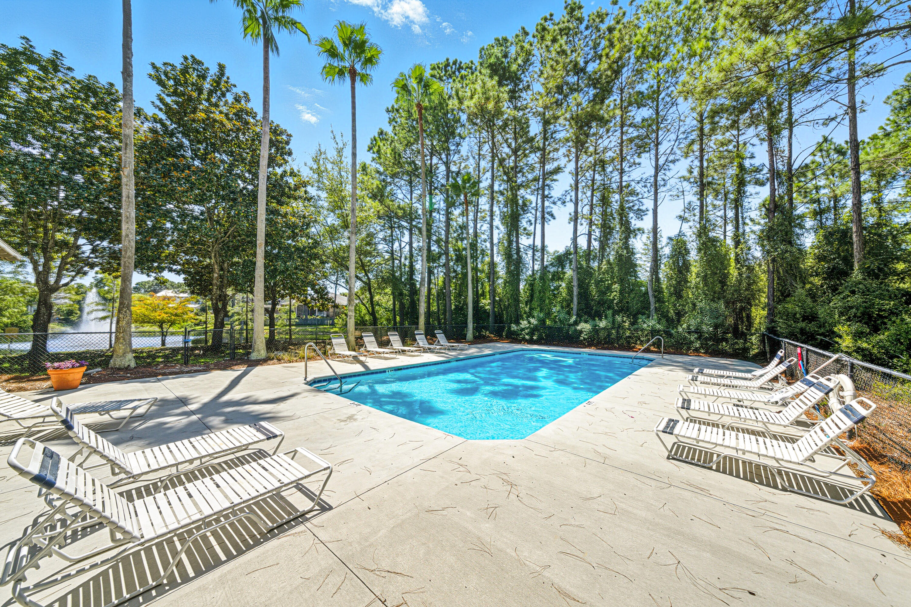 8 Corte Palma, Unit 61A Santa Rosa Beach, FL 32459 - Photo 28 of 32 a view of a backyard with swimming pool