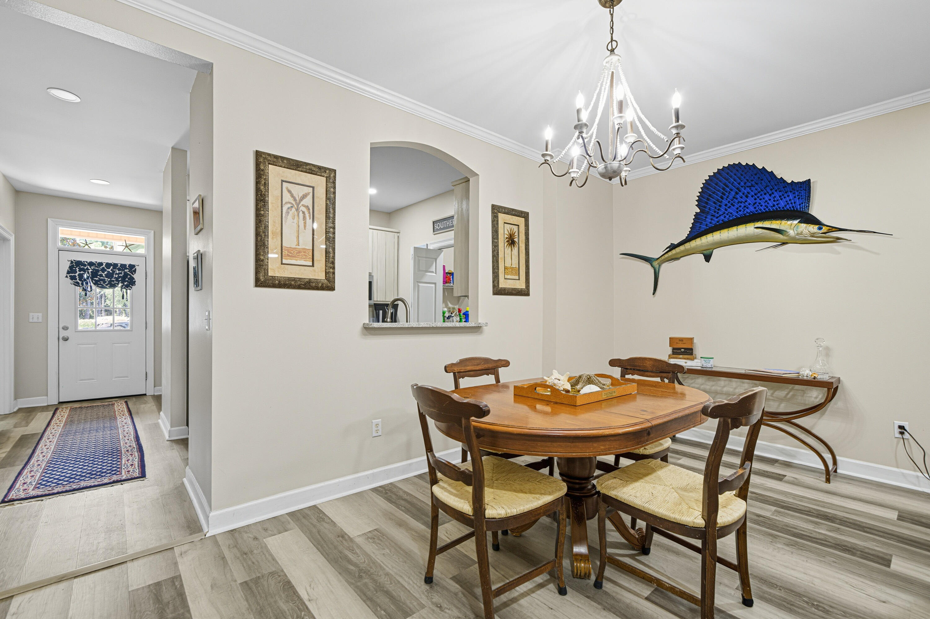 8 Corte Palma, Unit 61A Santa Rosa Beach, FL 32459 - Photo 7 of 32 a dining room with furniture and chandelier