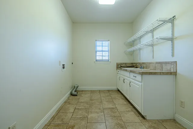 a view of a kitchen with a sink