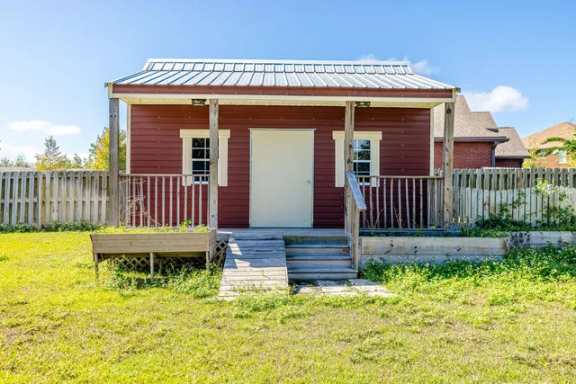 a view of an empty room with a large window