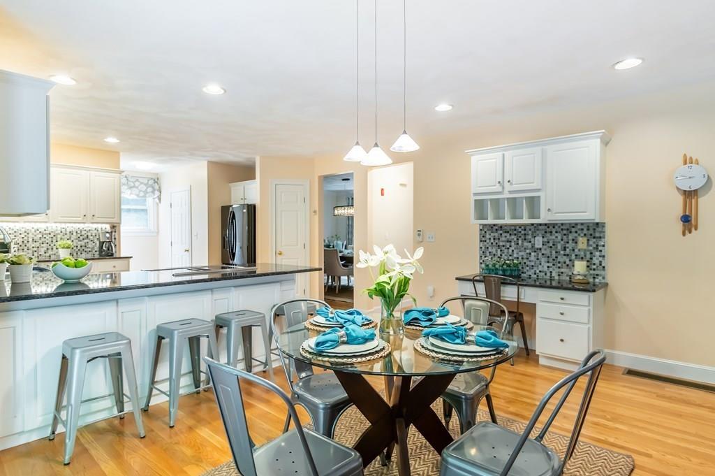 63 Rattlesnake Hill Road Andover, MA 01810 - Photo 13 of 40 a kitchen with a table and chairs in it