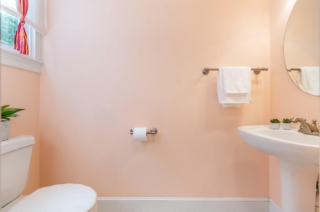 63 Rattlesnake Hill Road Andover, MA 01810 - Photo 18 of 40 a bathroom with a sink mirror and toilet