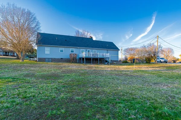 a view of a house with a big yard
