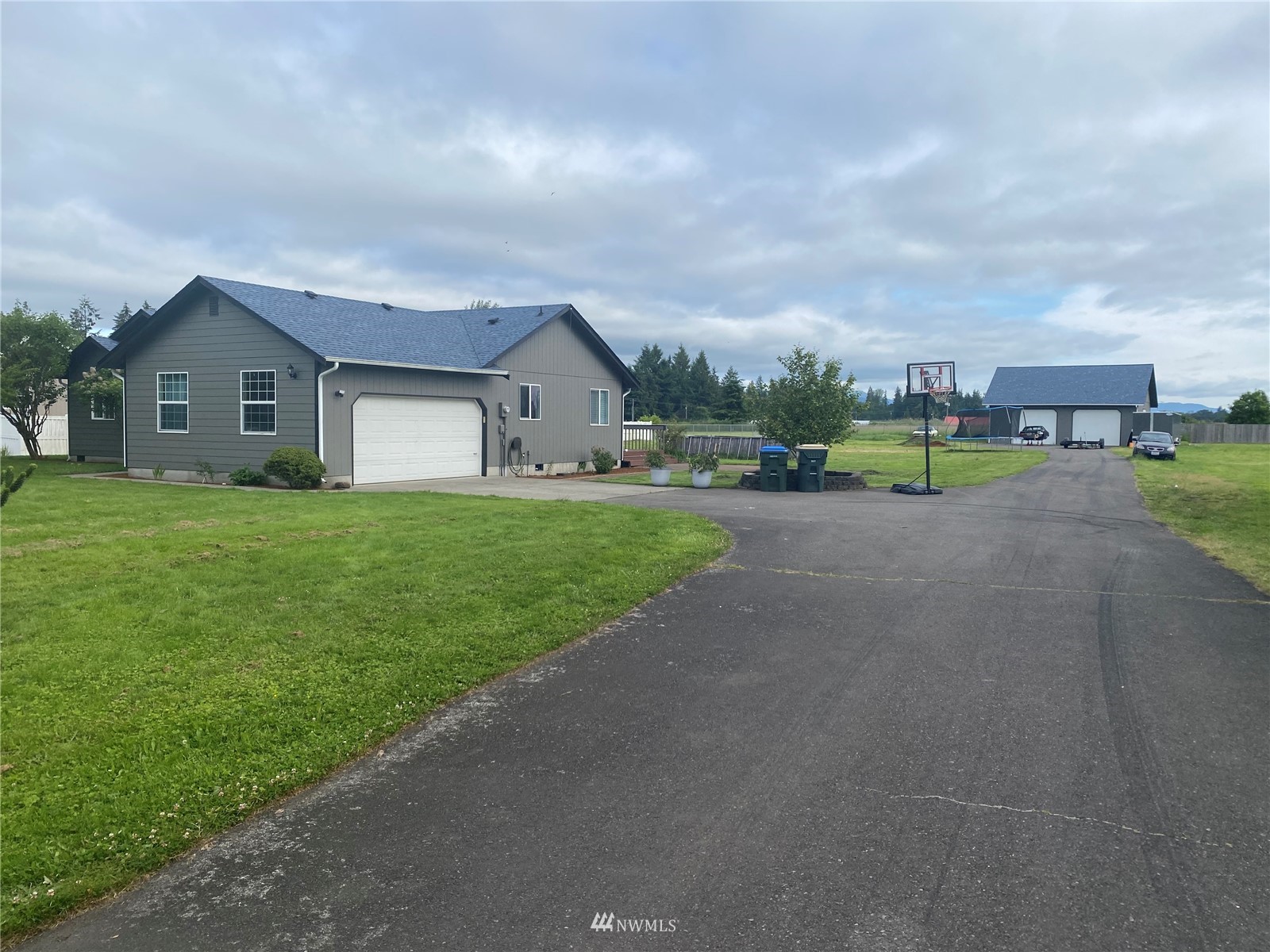 8620 194th Avenue Southwest Rochester, WA 98579 - Photo 8 of 29 a view of a house with a yard and pathway