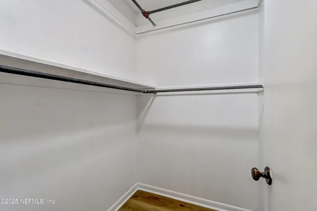 a view of a room with racks on the wall