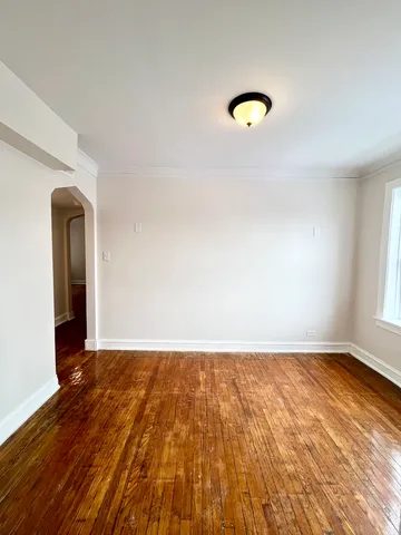 a view of an empty room and window