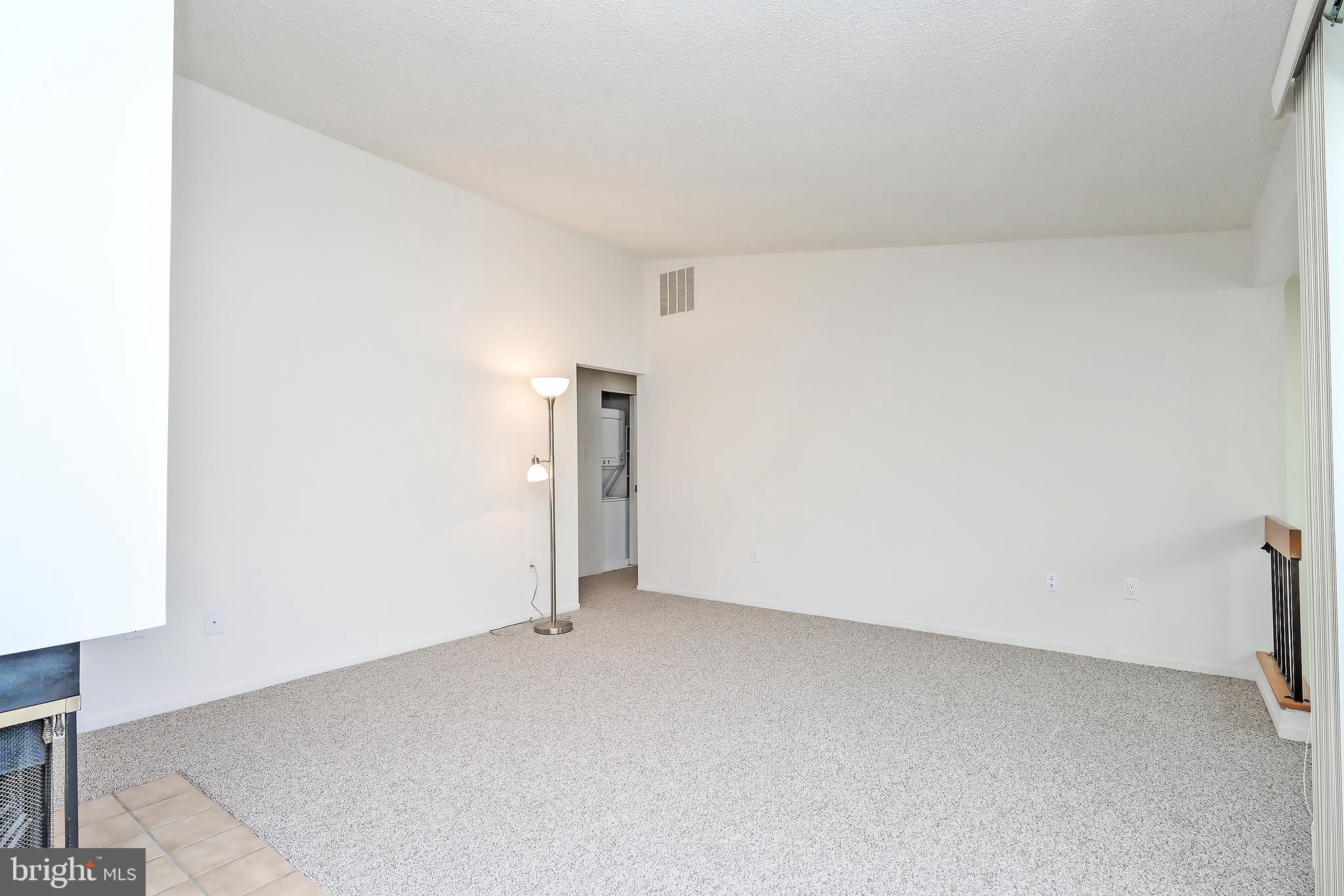 1963 B Villaridge Drive, Unit 1963B Reston, VA 20191 - Photo 3 of 41 Living Room with cathedral ceiling