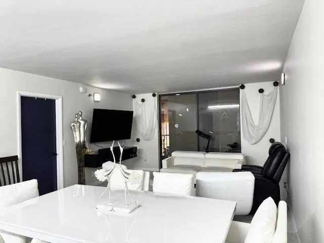 a kitchen with stainless steel appliances a stove and cabinets