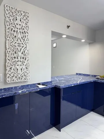 a view of a table and chairs in a room