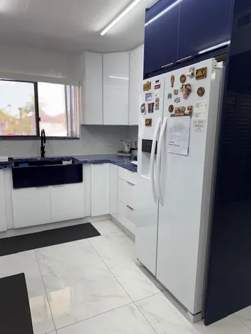 a bathroom with a sink and mirror