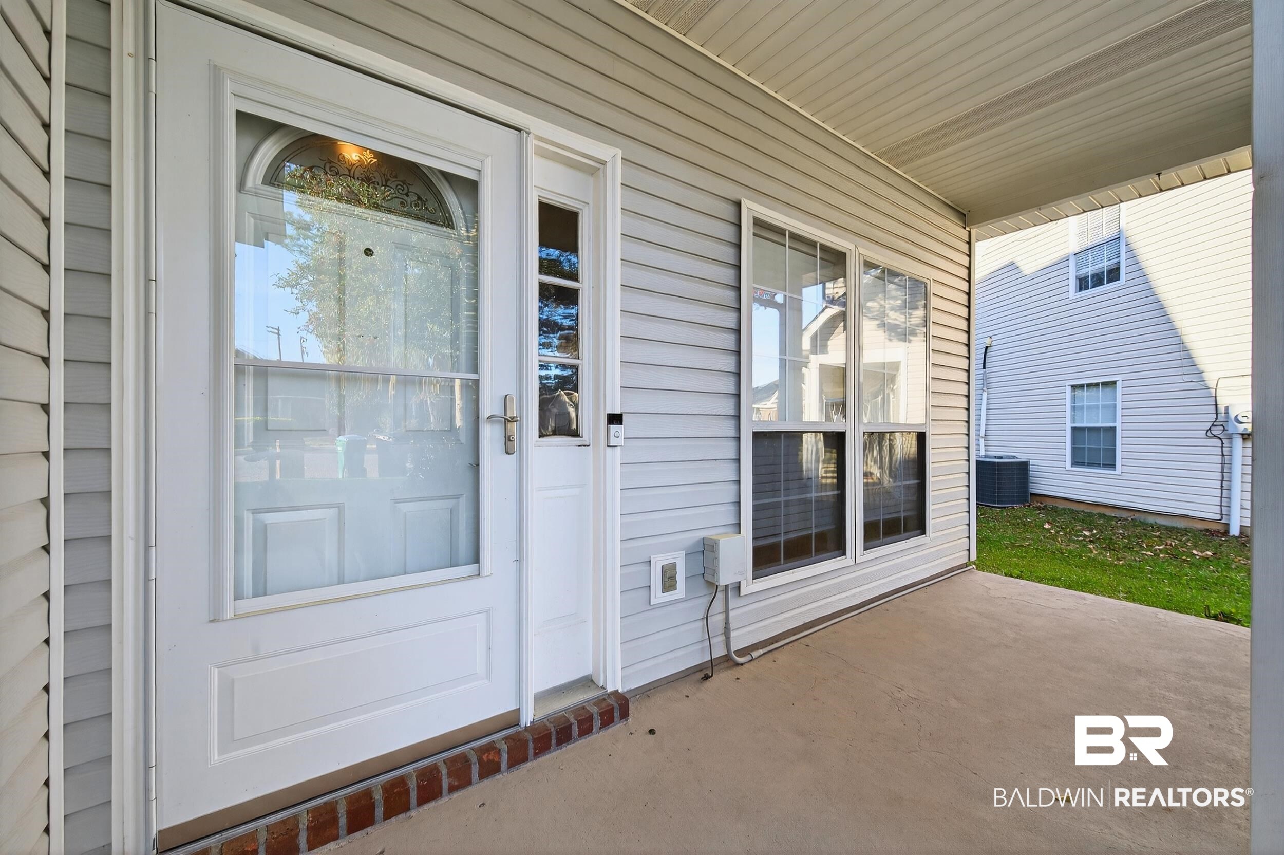 7050 Highpointe Place West Daphne, AL 36527 - Photo 5 of 66 Property entrance with a patio area