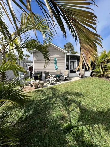 a view of a building with sitting area