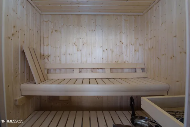 a view of swimming pool with outdoor seating