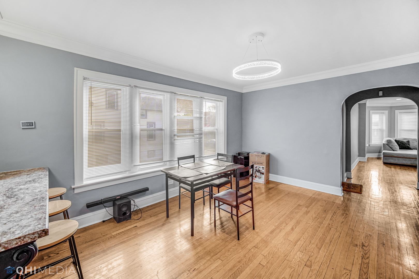 52 West 112th Street Chicago, IL 60628 - Photo 11 of 28 a workspace with furniture window and wooden floor
