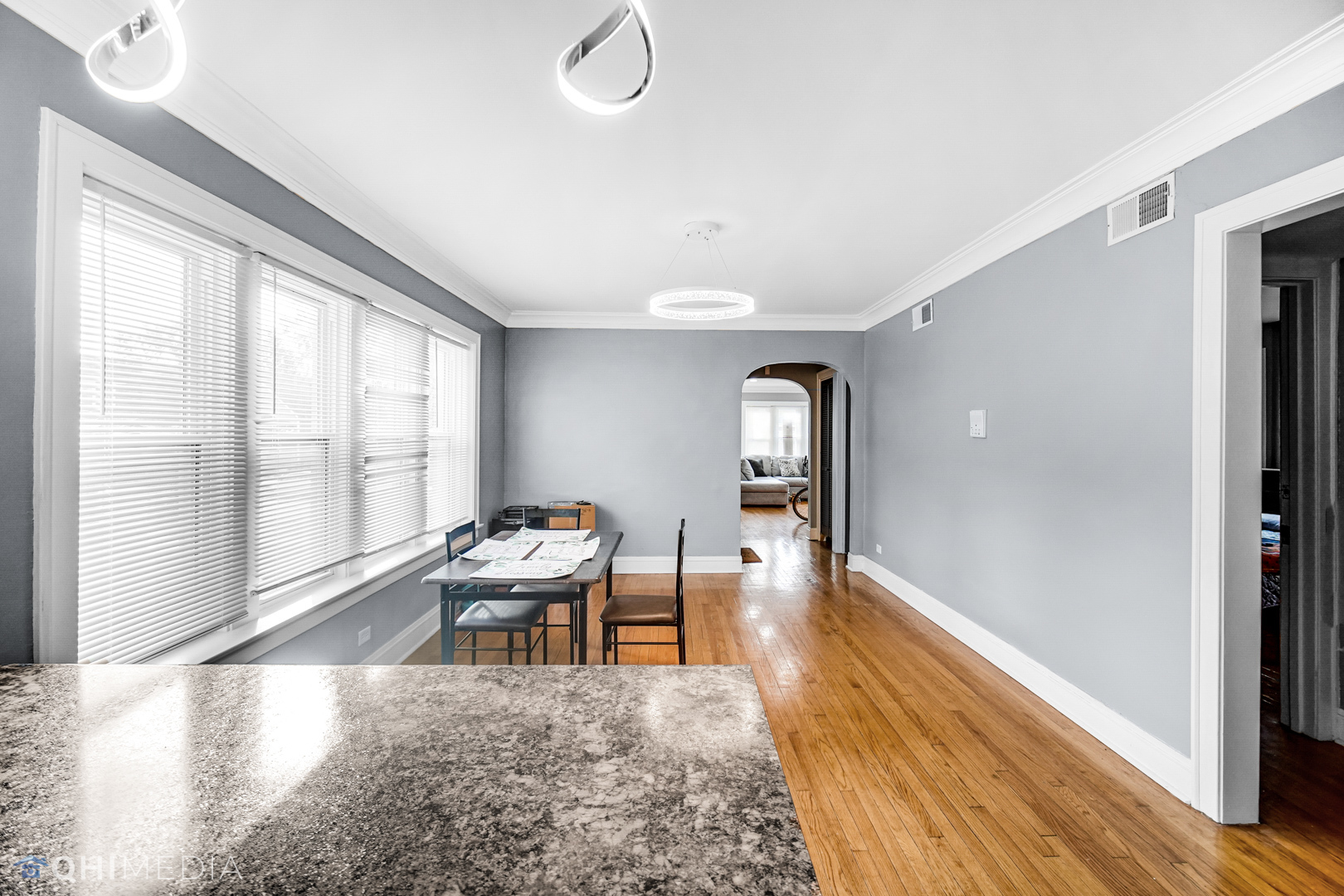 52 West 112th Street Chicago, IL 60628 - Photo 13 of 28 a living room with furniture and large windows