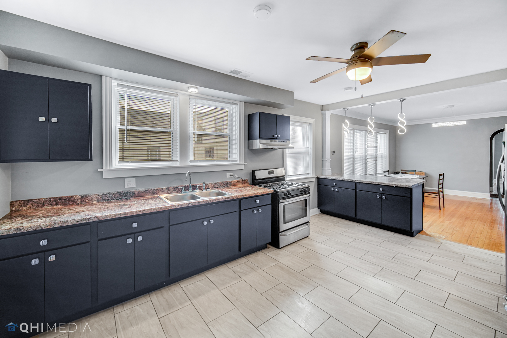 52 West 112th Street Chicago, IL 60628 - Photo 14 of 28 a large kitchen with a large window