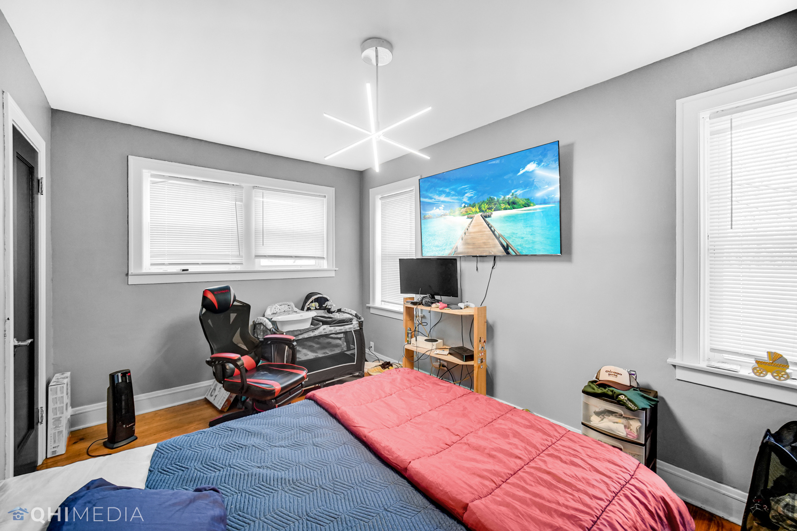 52 West 112th Street Chicago, IL 60628 - Photo 17 of 28 a bedroom with a bed and a window