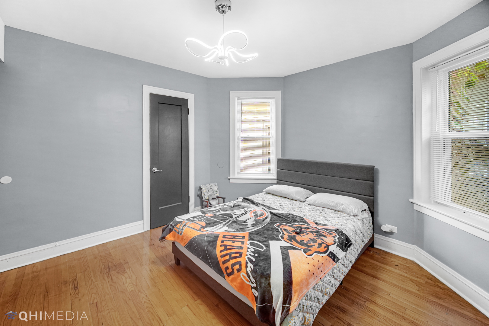 52 West 112th Street Chicago, IL 60628 - Photo 19 of 28 a bedroom with bed and window