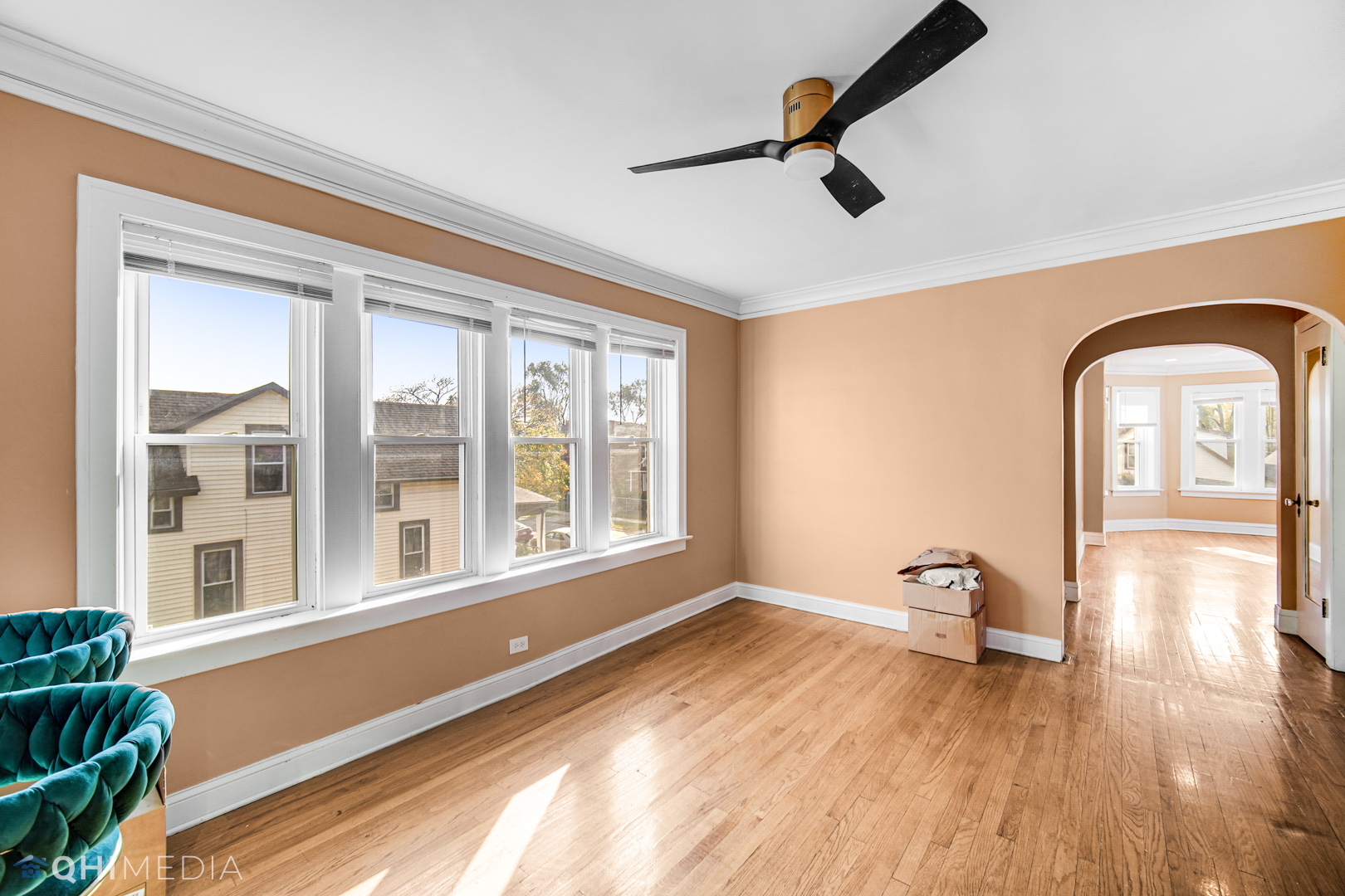 52 West 112th Street Chicago, IL 60628 - Photo 20 of 28 a view of empty room with a window and wooden floor