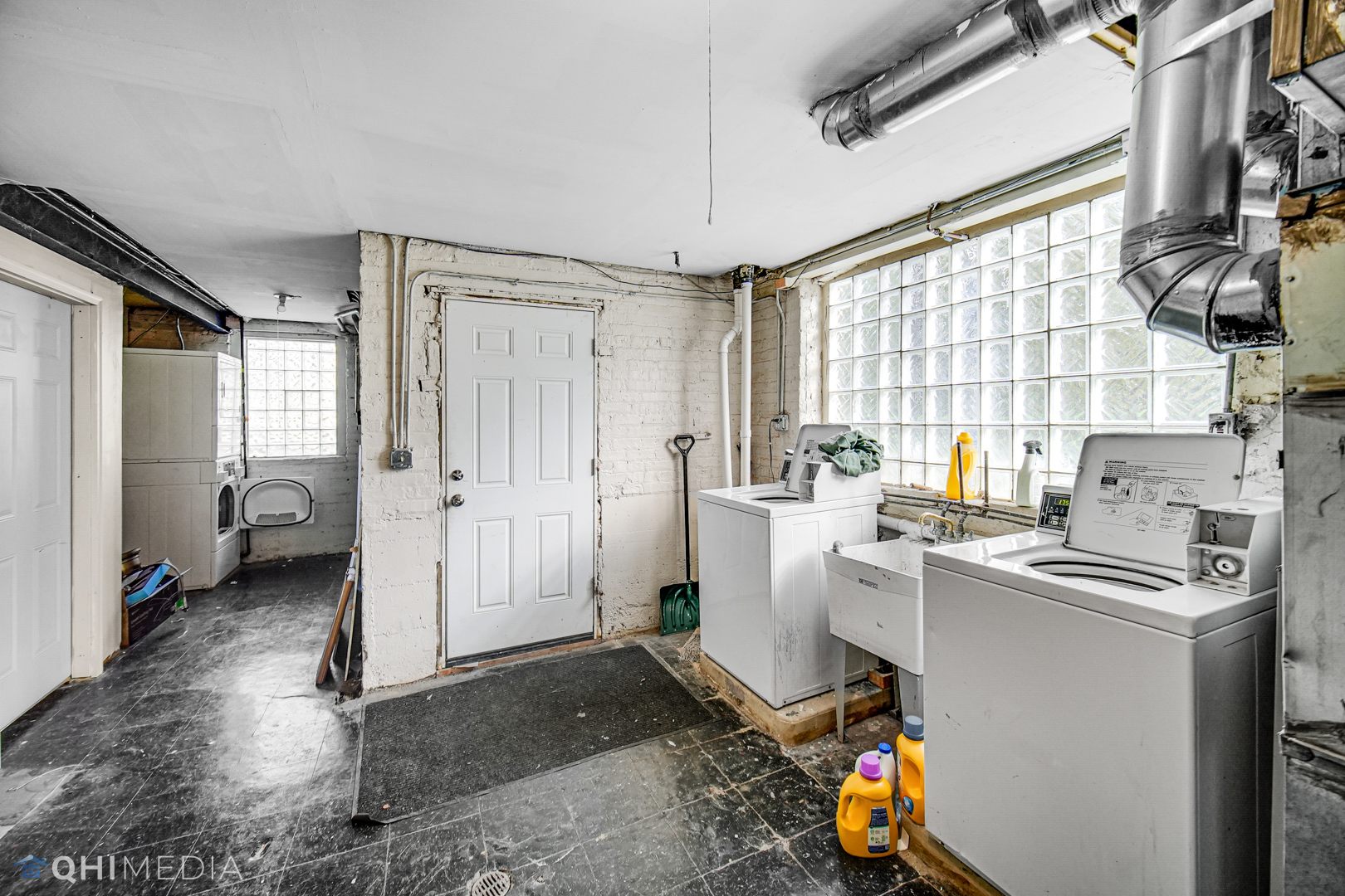 52 West 112th Street Chicago, IL 60628 - Photo 25 of 28 a room with storage and utility