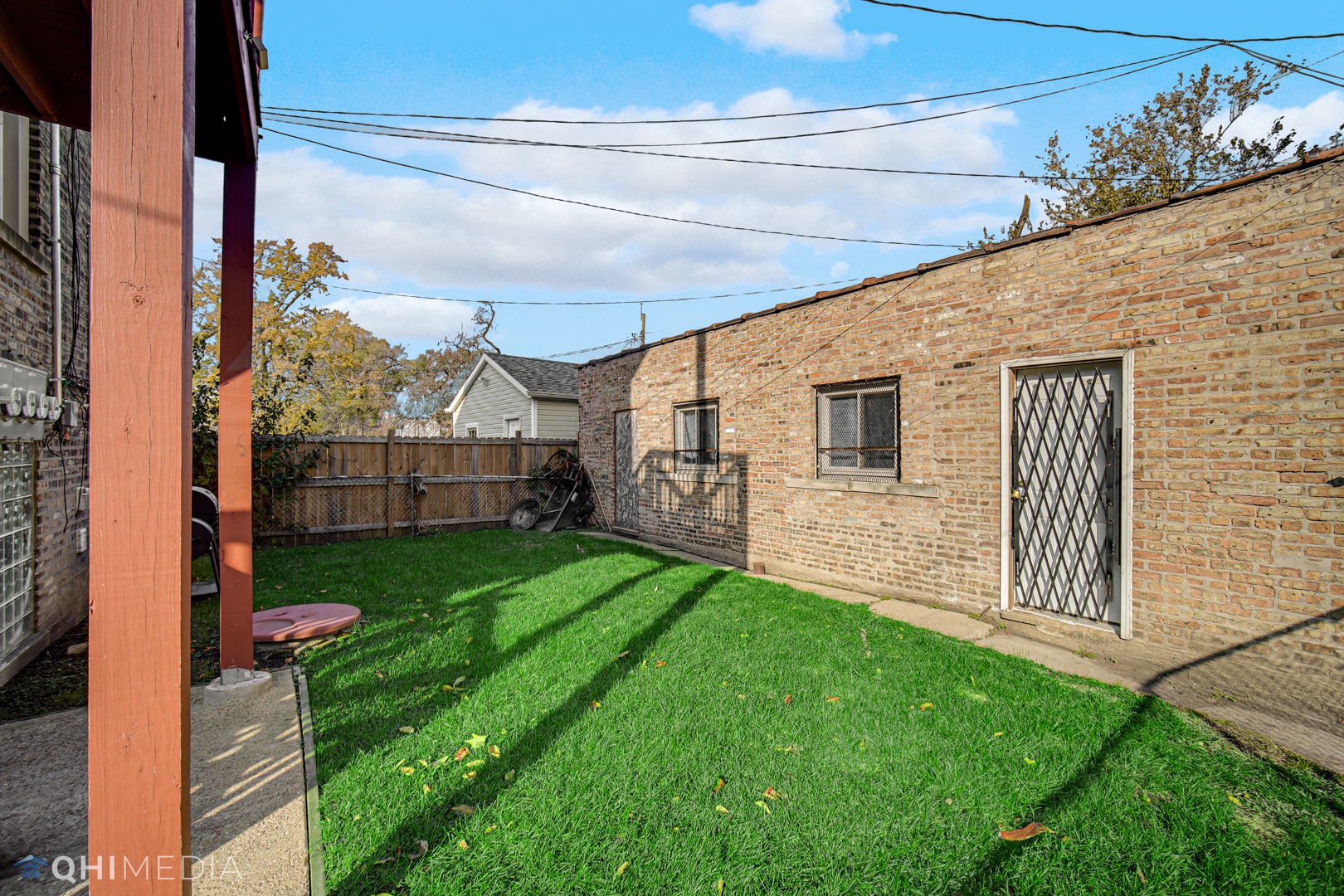 52 West 112th Street Chicago, IL 60628 - Photo 26 of 28 a view of back yard of the house