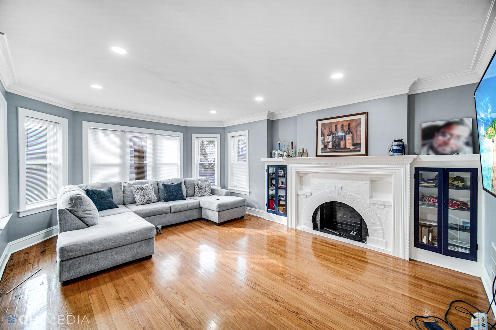 52 West 112th Street Chicago, IL 60628 - Photo 8 of 28 a living room with furniture and a fireplace