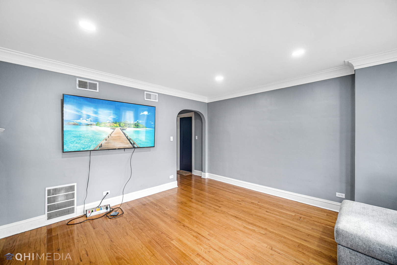 52 West 112th Street Chicago, IL 60628 - Photo 9 of 28 a view of a room with wooden floor and livingroom