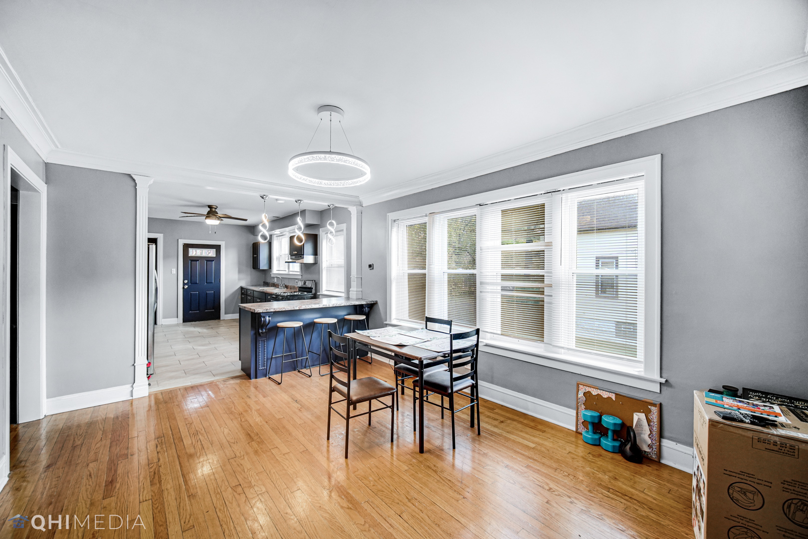 52 West 112th Street Chicago, IL 60628 - Photo 10 of 28 a view of a dining room with furniture window and wooden floor