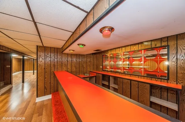 a sitting area with view of the back of the building