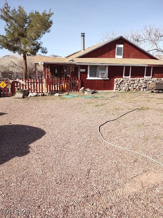 LOOKING FROM DRIVEWAY/PARKING