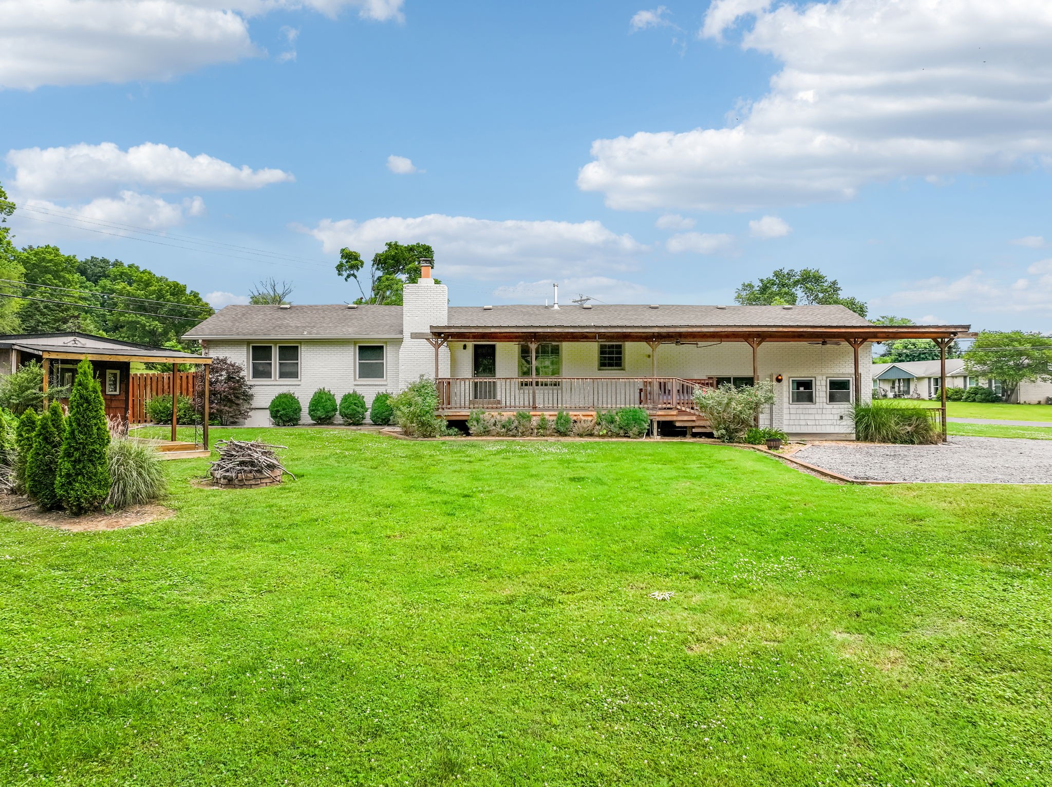 102 Pascal Drive Mount Juliet, TN 37122 - Photo 30 of 41 a front view of a house with a yard table and chairs