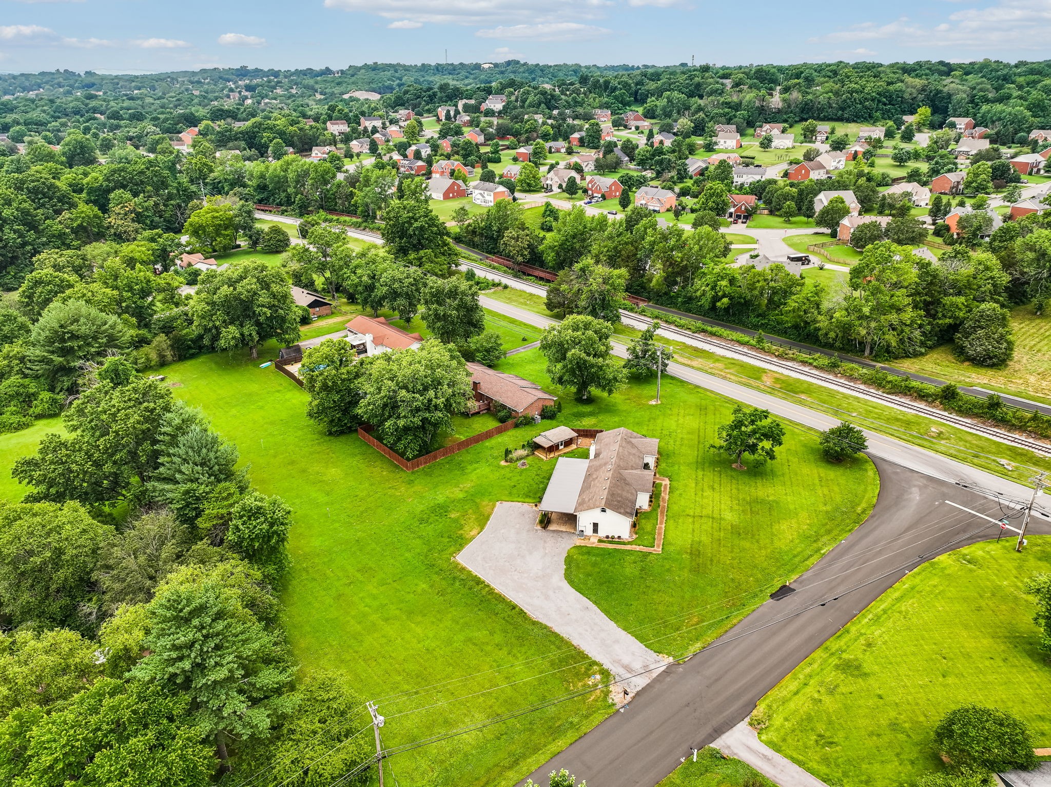 102 Pascal Drive Mount Juliet, TN 37122 - Photo 35 of 41 an aerial view of a residential houses with outdoor space and a lake view