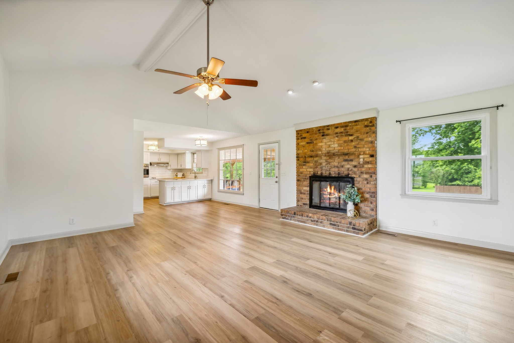 102 Pascal Drive Mount Juliet, TN 37122 - Photo 4 of 41 a view of an empty room with a window and wooden floor