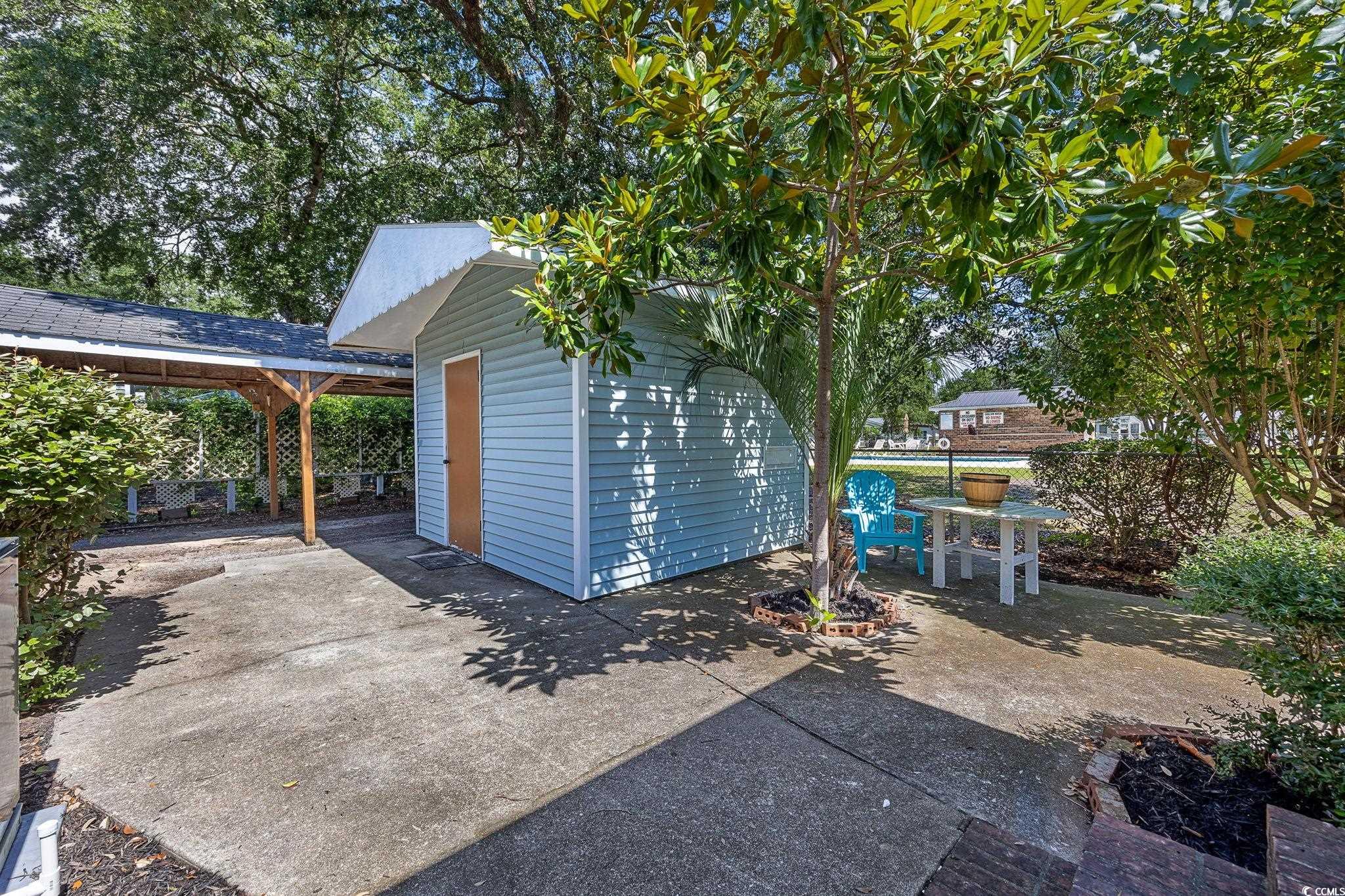 983 South Marlin Circle Murrells Inlet, SC 29576 - Photo 25 of 40 View of patio featuring an outbuilding