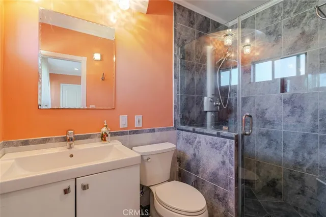 a bathroom with a tub and shower