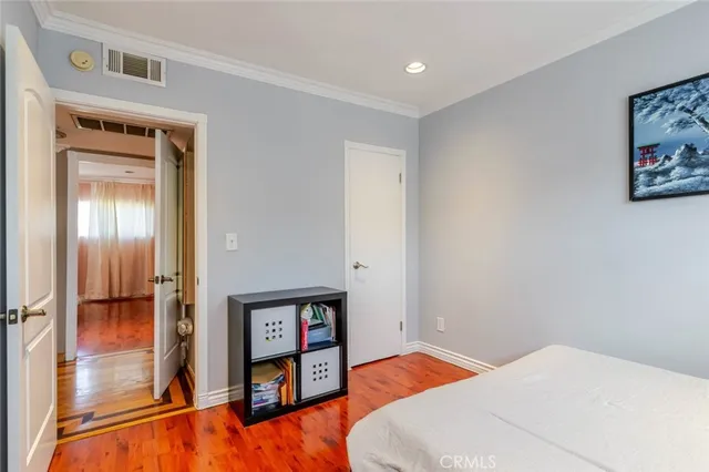a balcony with furniture and a yard