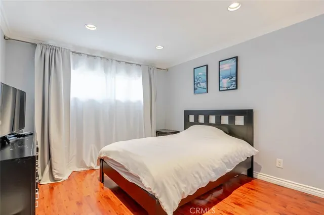 a front view of a building with plants