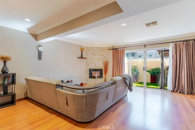 a kitchen with stainless steel appliances a stove and a microwave